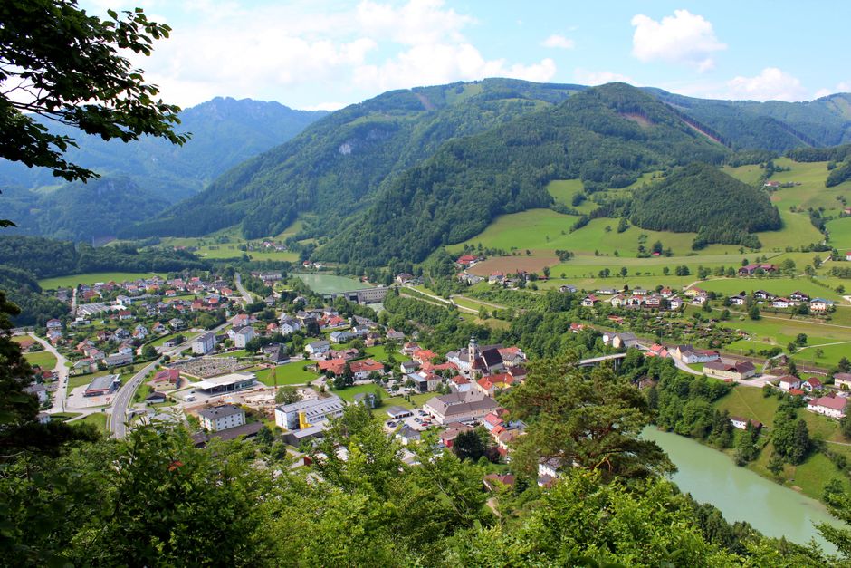 Aerial view of Ternberg, Austria featuring lush landscapes and the Enns River.